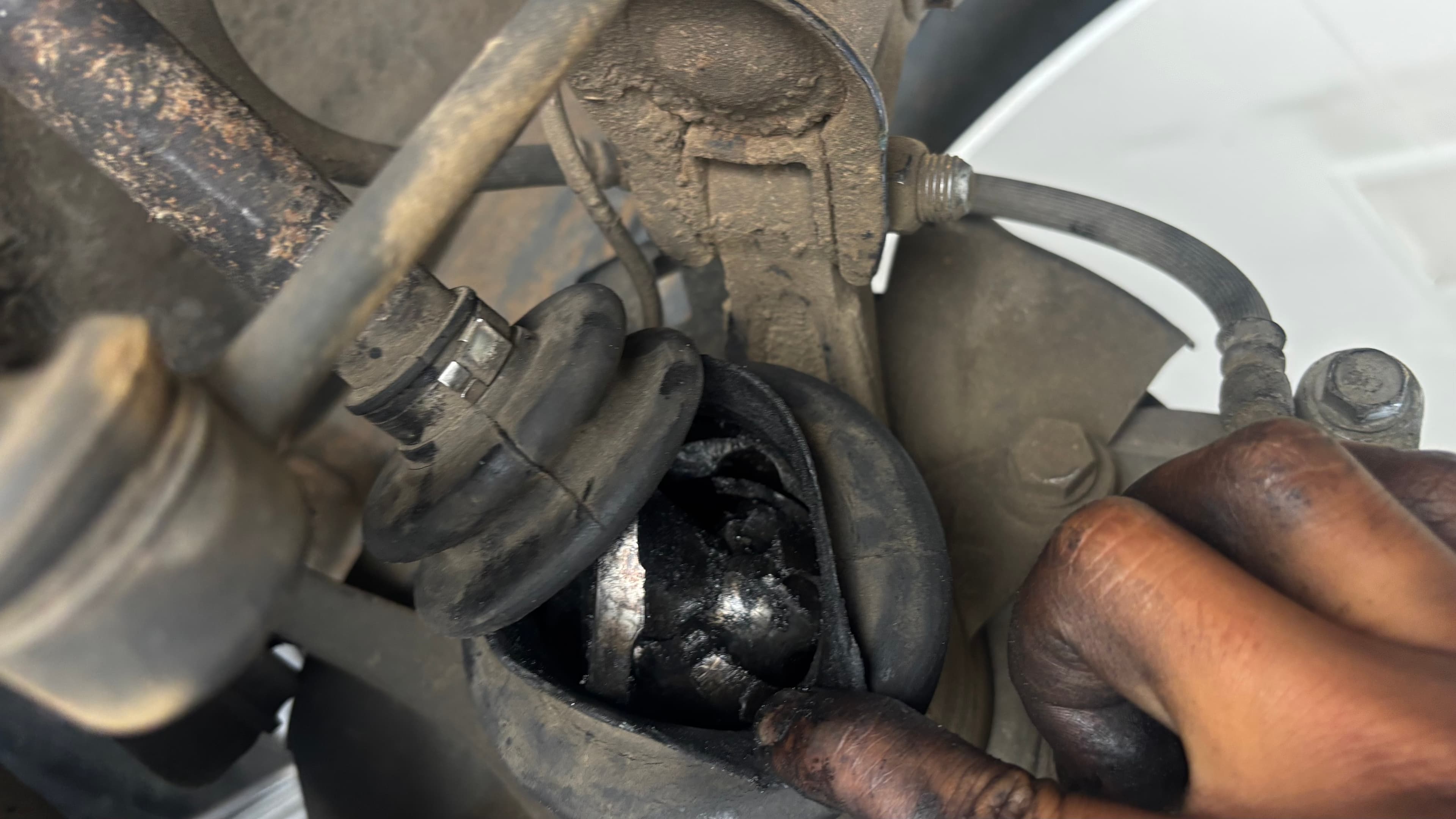Close-up of the damaged CV joint discovered on the car